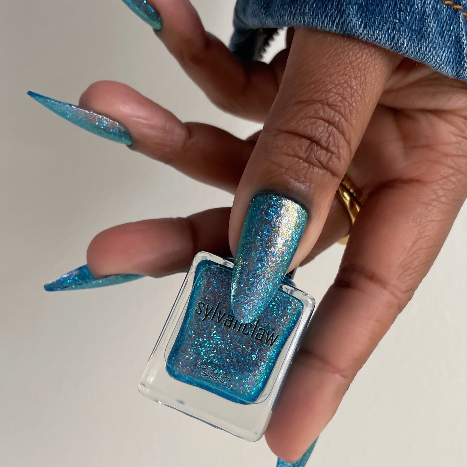 Blue Glitter Nail Polish - Unique Nails - Pondering -  Thumb Bottle Image