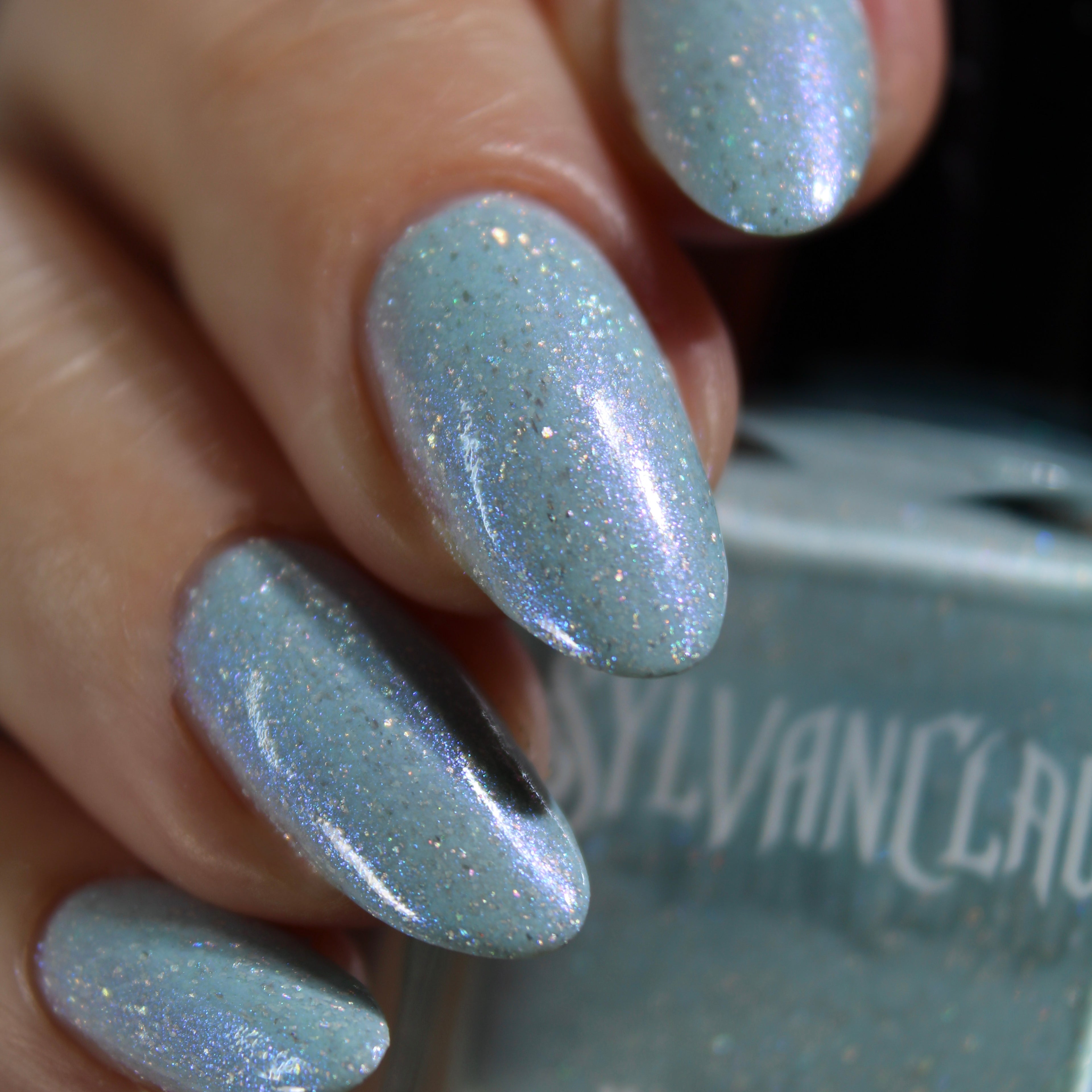 cinderella blue nail polish, shimmer nails, sylvanclaw, bottle image, lovemesomesparkle