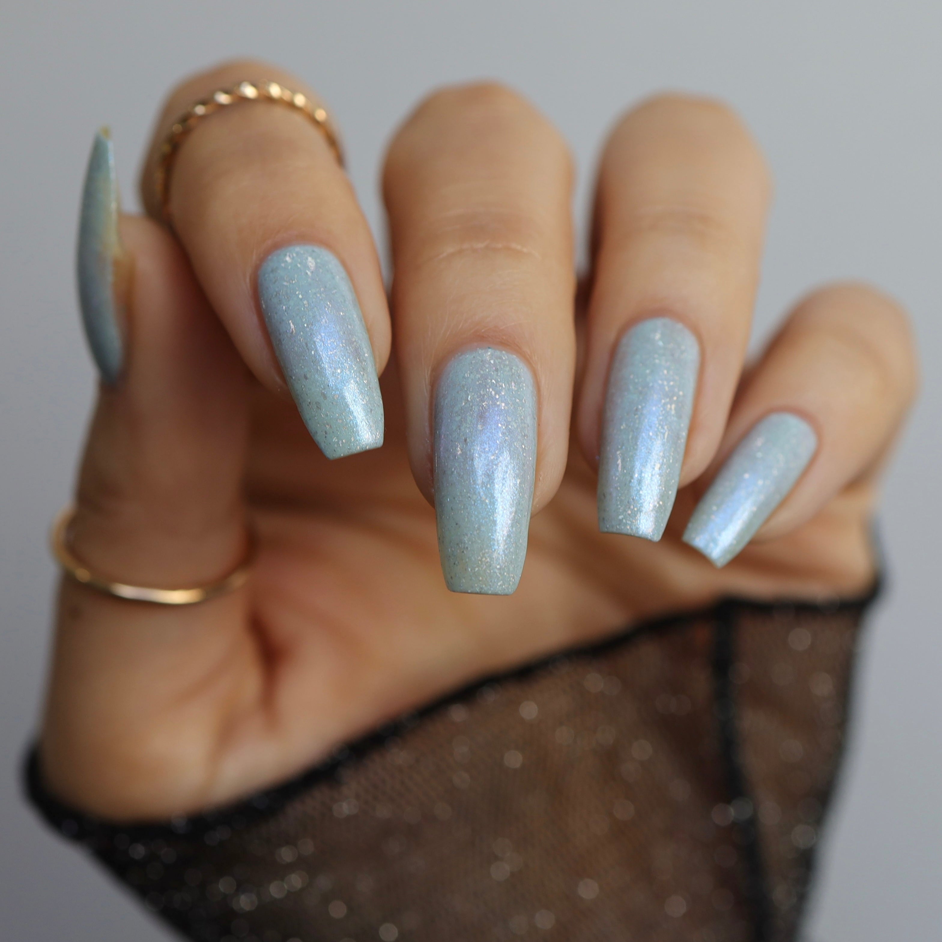 cinderella blue nail polish, shimmer nails, sylvanclaw, indirect light, polishedbookworm