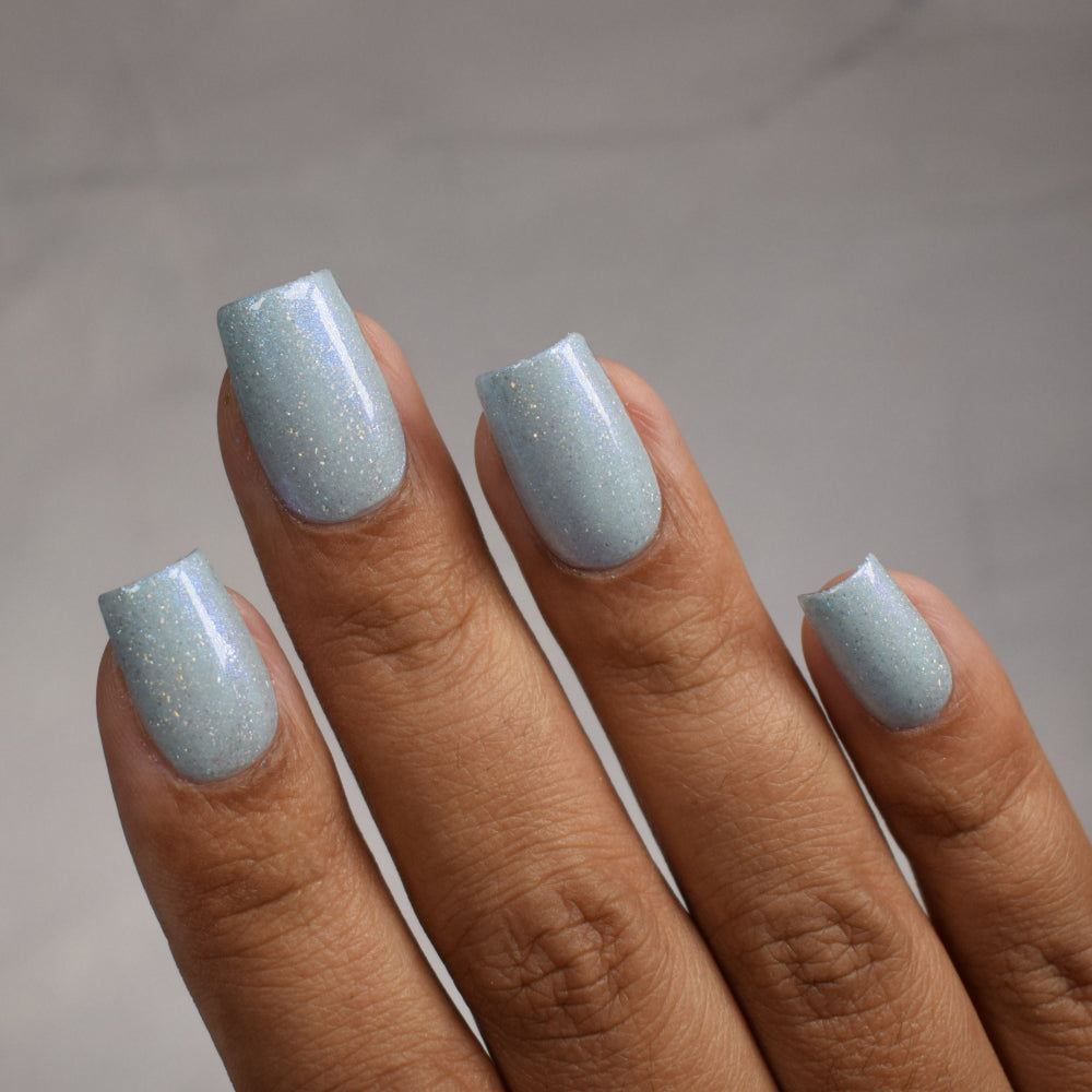 cinderella blue nail polish, shimmer nails, sylvanclaw, indirect light, thepolishedmage