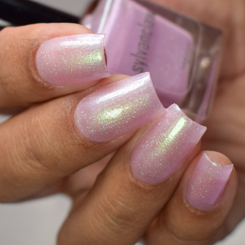 Wingin' It Nail Polish, Pink Nail Polish, Holographic Nail Polish, Shimmer Nail Polish, Top Down Side Angle Image