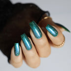 teal holographic nail polish, shimmer nails, sylvanclaw, indirect light, polishedbookworm