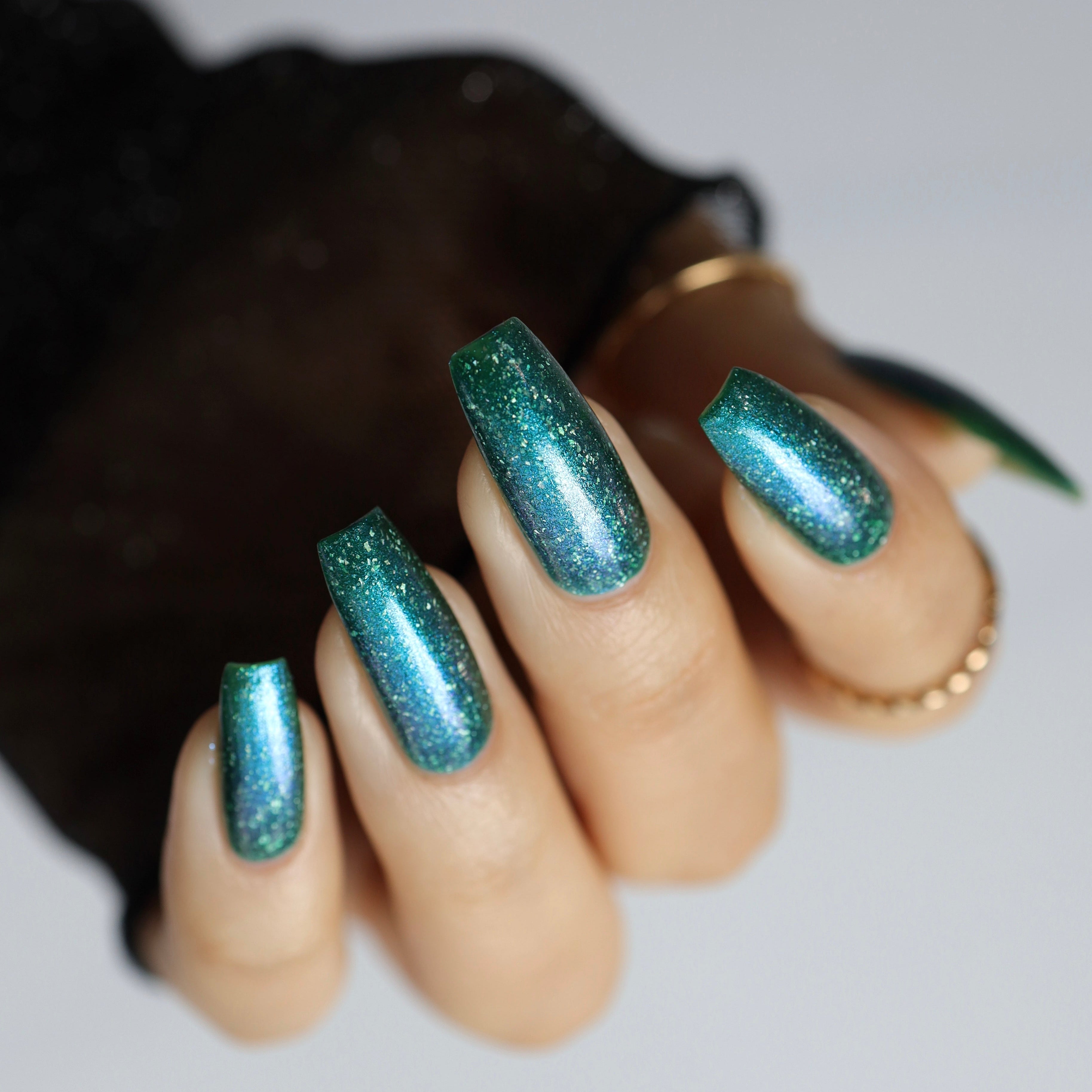teal holographic nail polish, shimmer nails, sylvanclaw, indirect light, polishedbookworm