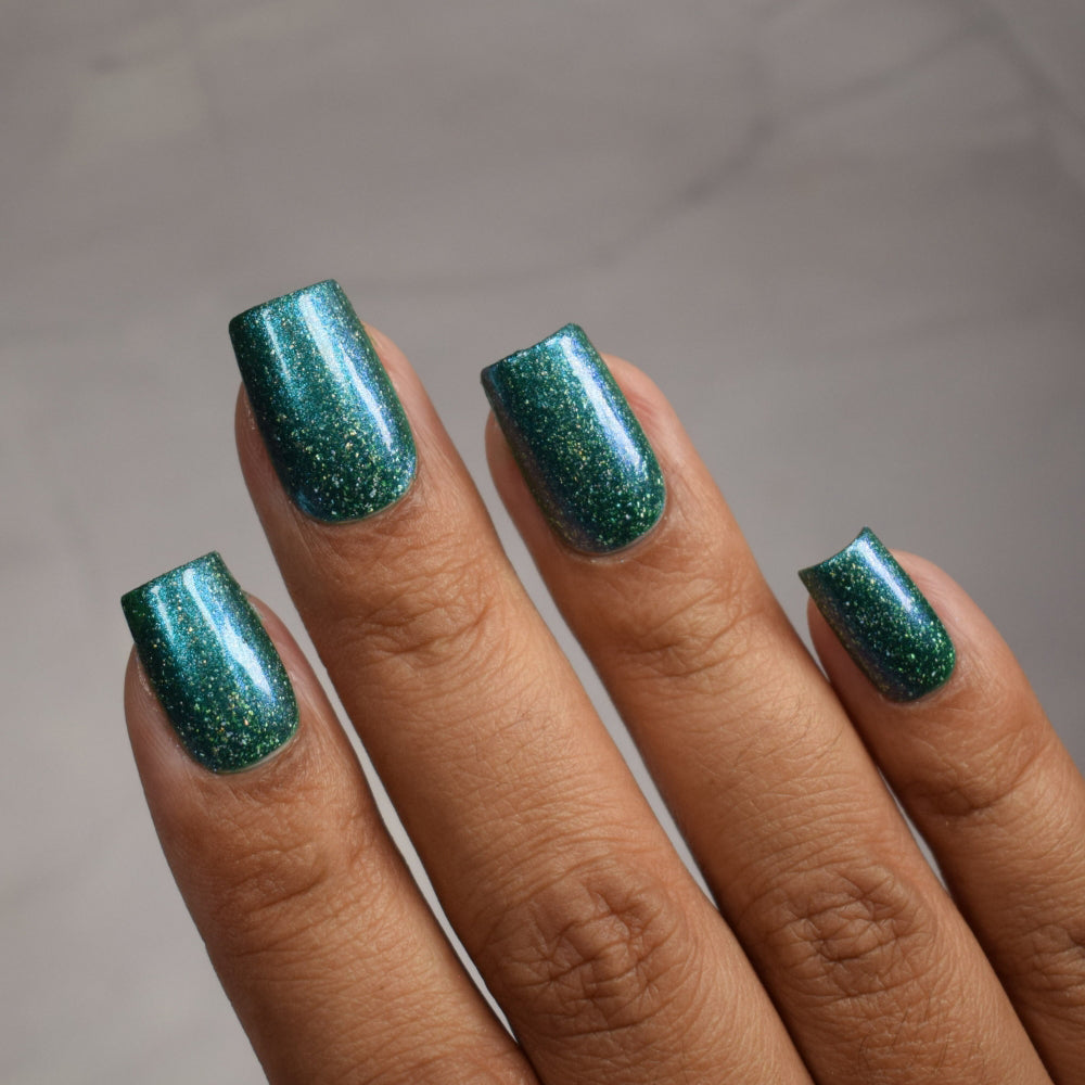 teal holographic nail polish, shimmer nails, sylvanclaw, indirect light, thepolishedmage
